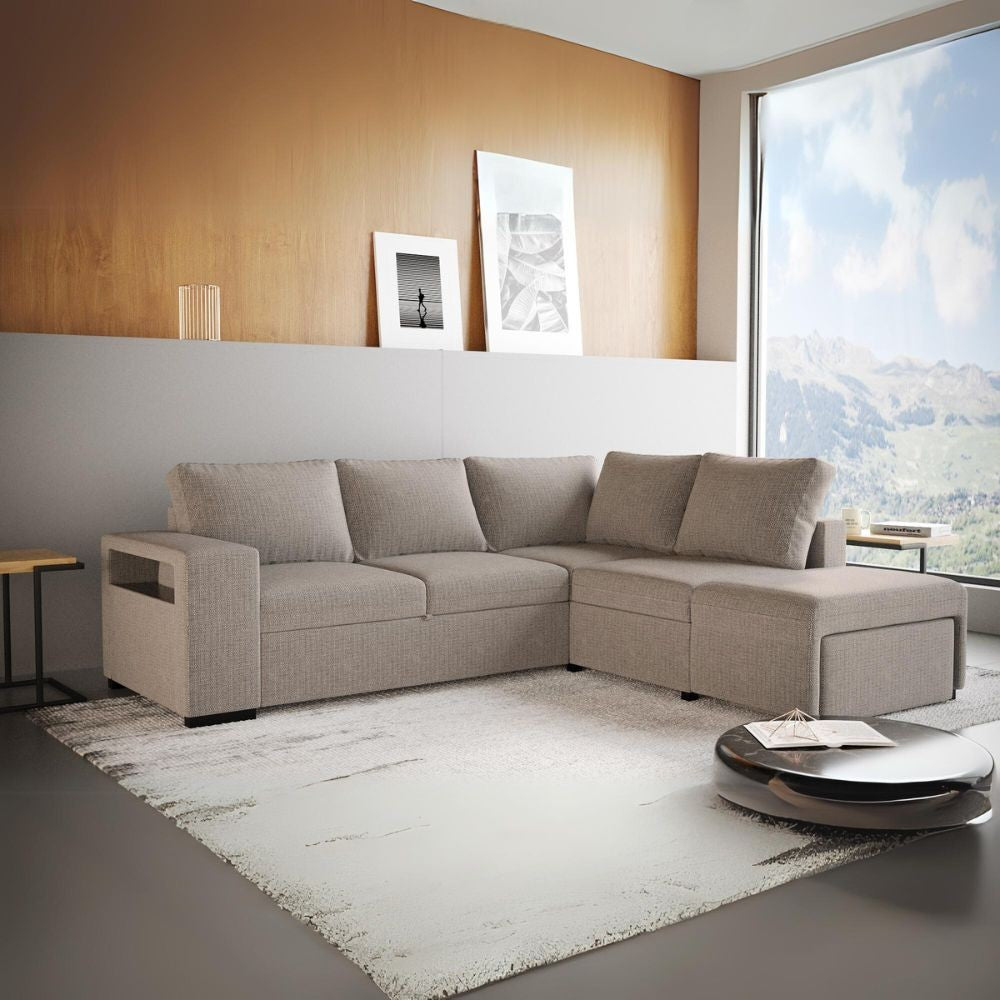 Divano letto angolare reversibile Jozzis con vano contenitore e pouf in tessuto Dubai G0741 sabbia
