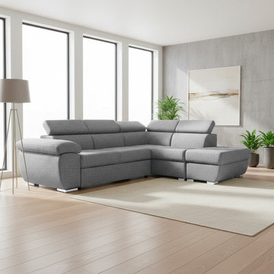 Divano letto Fiona angolare con penisola destra e pouf contenitore in tessuto Aragon 83 grigio