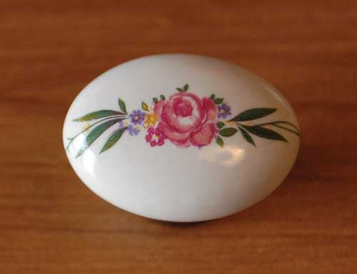 Ovalino ceramica art.148 bianco base bronzata