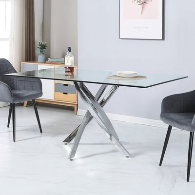 Tavolo da pranzo rettangolare fisso Peyton con piano in vetro temperato e gambe cromate 160x90 cm.